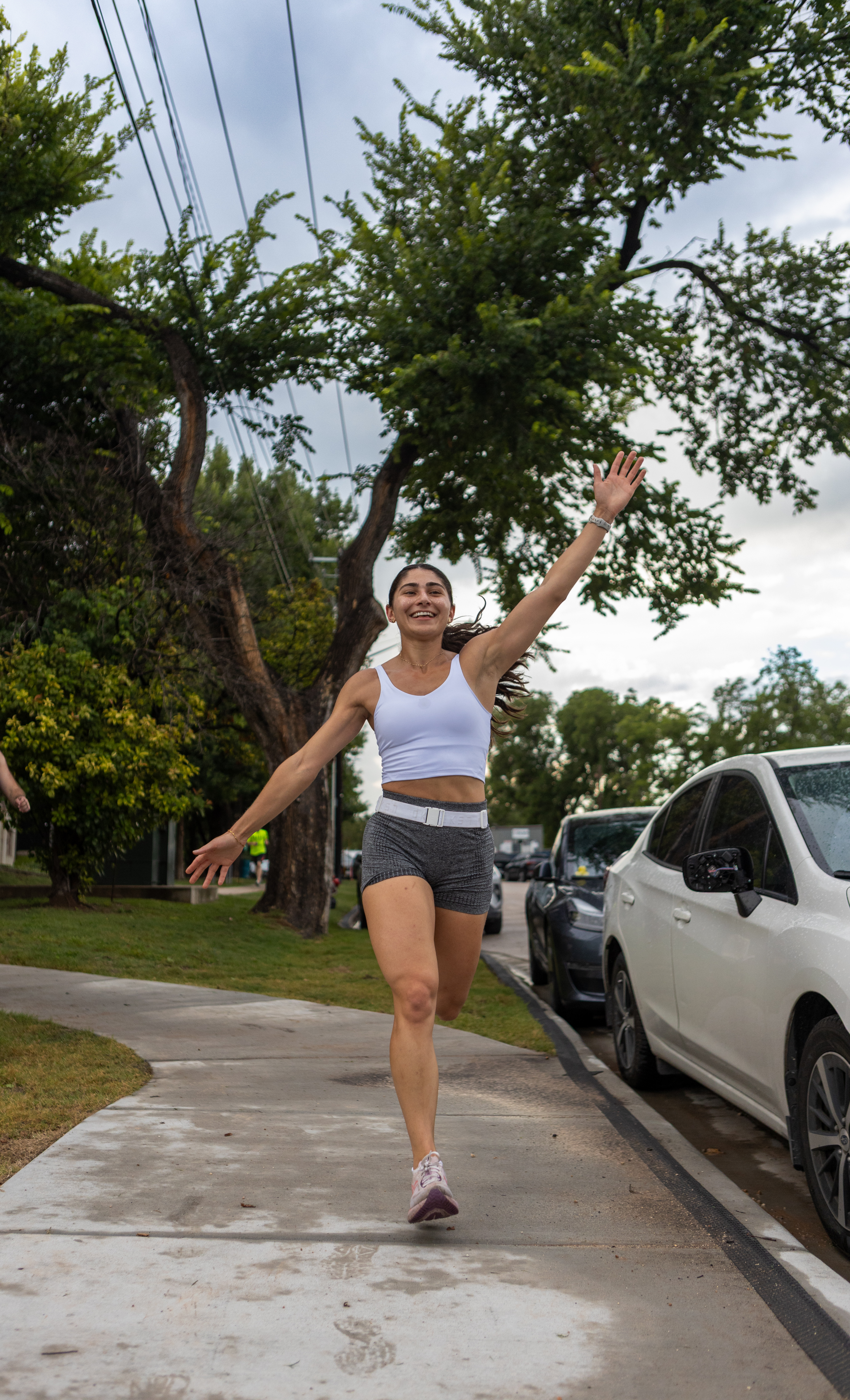 Dr. Syra running at a fitness event